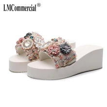 One-word flip-flops summer muffin thick-soled anti-skid tour new beach rising slope beach slippers luxury shoes women designers europe rising fashion designers