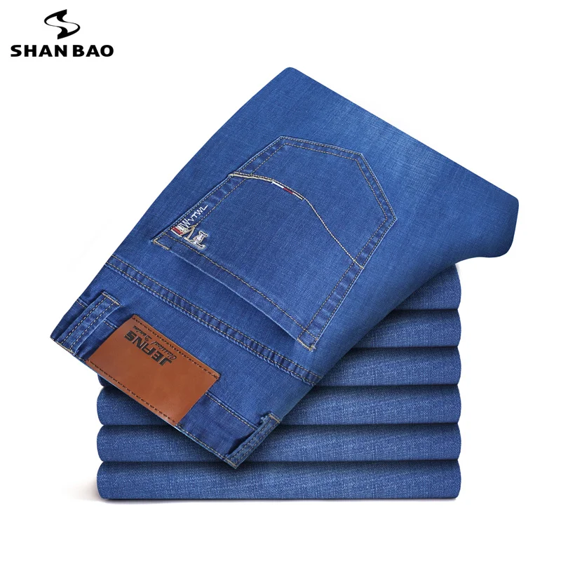 

SHANBAO brand men's trousers 2019 spring and Autumn new letters color embroidery slim jeans cotton stretch large size pants