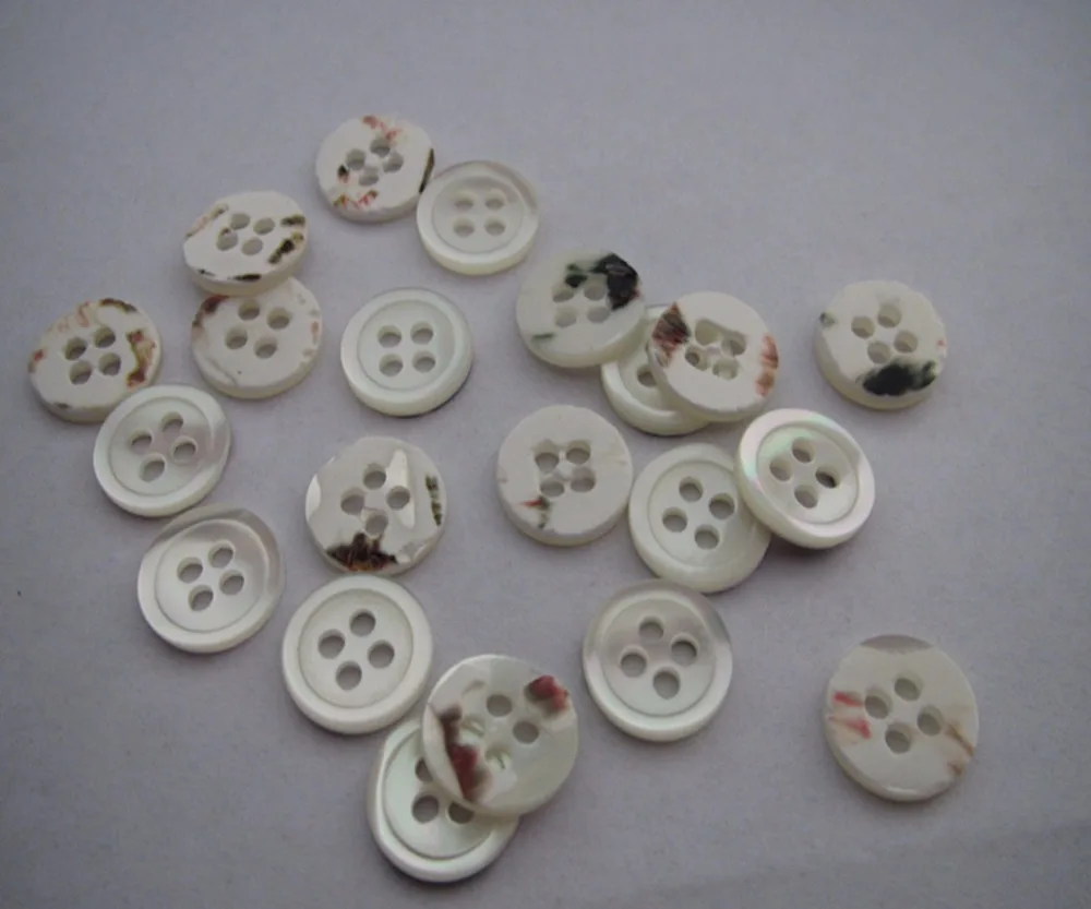 

Free shipping 9mm trocas shell button have round edge white color 4 holes high grade fashion mother of shell button 100pcs