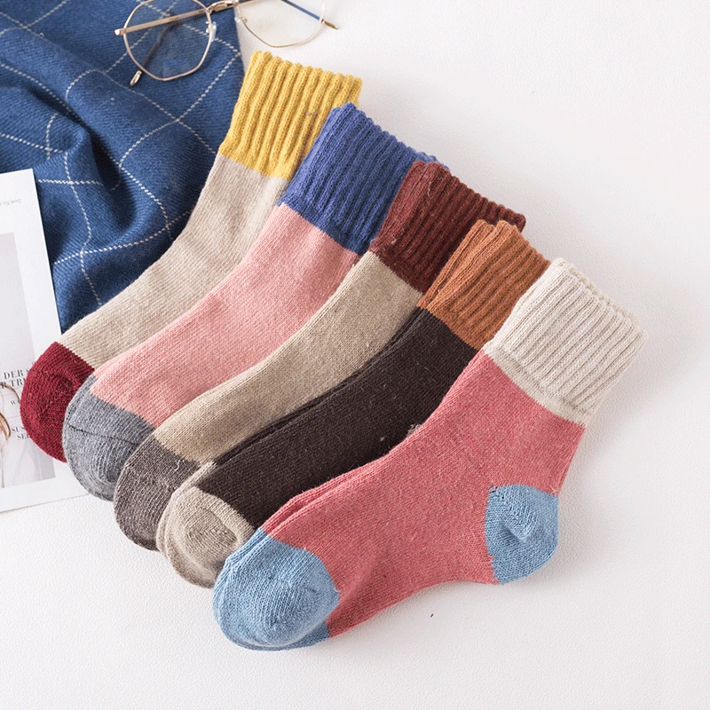 

5 pairs of autumn and winter wool socks warm casual ladies color matching wool socks in the tube female socks cute