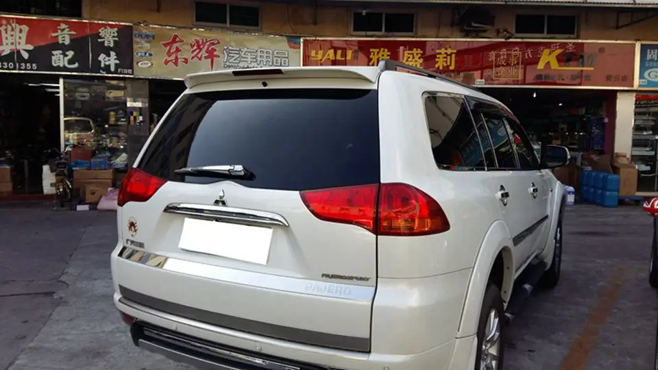 Использовать для mitsubishi pajero спортивный спойлер 2004- pajero спортивный спойлер с зажигалками материал заднего крыла автомобиля цветной спойлер