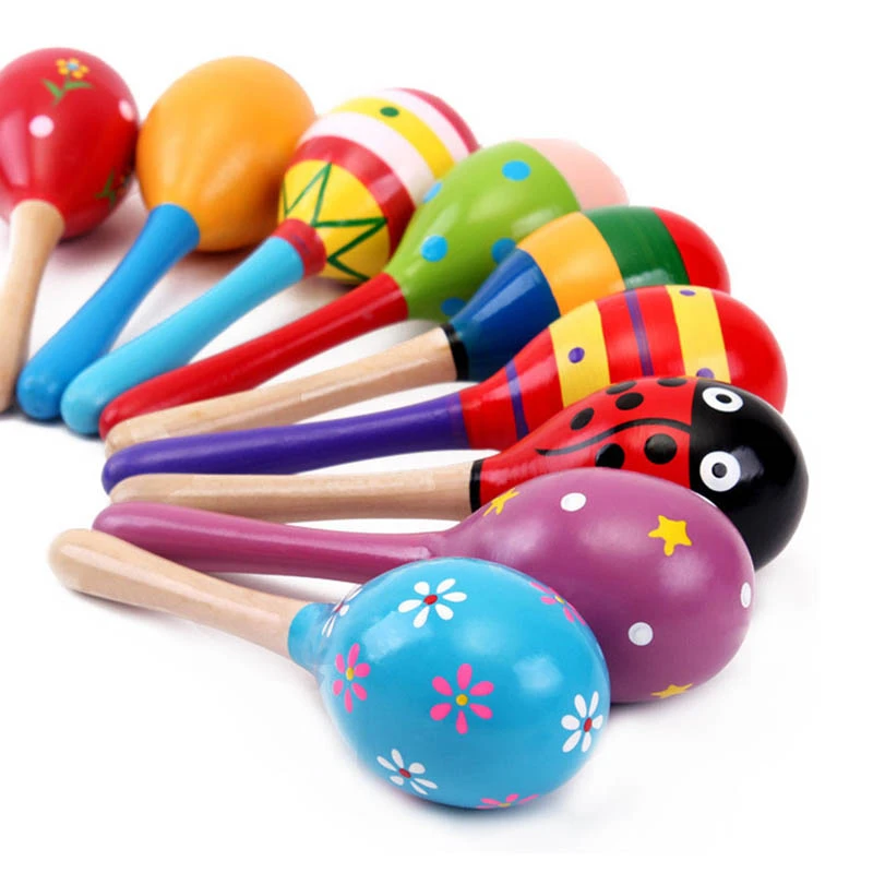 Hochets Colores Pour Bebe Dessin Anime Son De Sable Raye Points Impression Solide Carillons Sonnette Jouets En Bois Nouveau Aliexpress