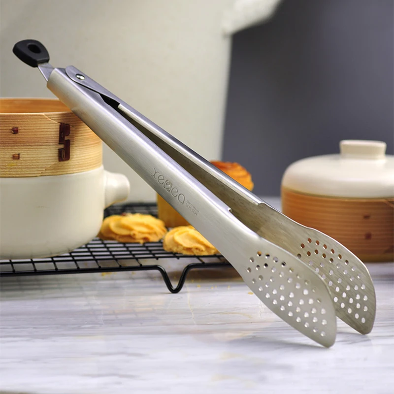 https://ae01.alicdn.com/kf/HTB1a5hLfKuSBuNjy1Xcq6AYjFXac/Non-Stick-Kitchen-Tongs-Stainless-Steel-BBQ-Barbecue-Tongs-Pizza-Bread-Steak-Tong-Clip-Salad-Pastry.jpg