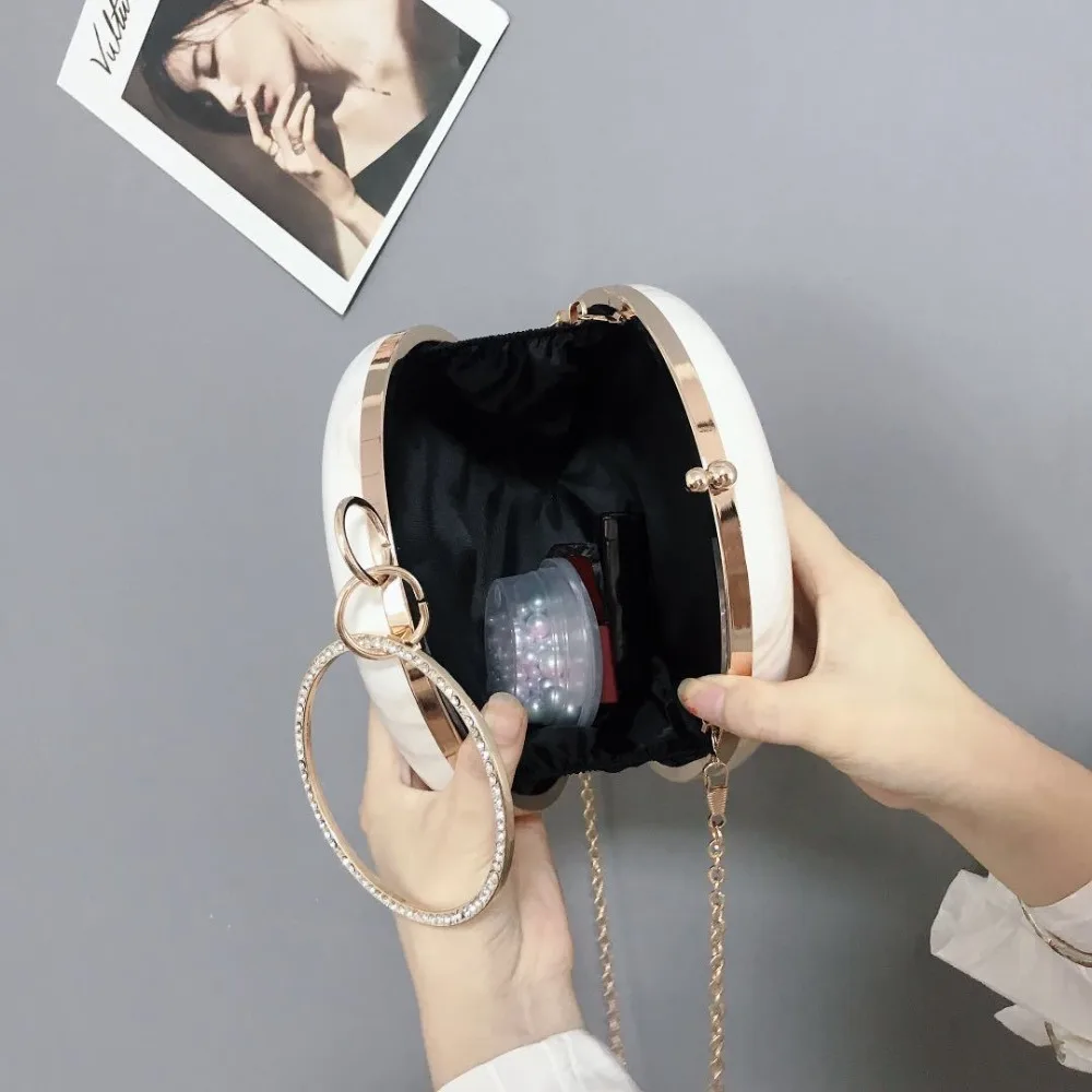 Meloke 2019 hot Women handmade round designer evening bag simple PU leather handbag female Clutches Chain Shoulder Bags M1141 Meloke 2019 hot Women handmade round designer evening bag simple PU leather handbag female Clutches Chain Shoulder Bags M1141