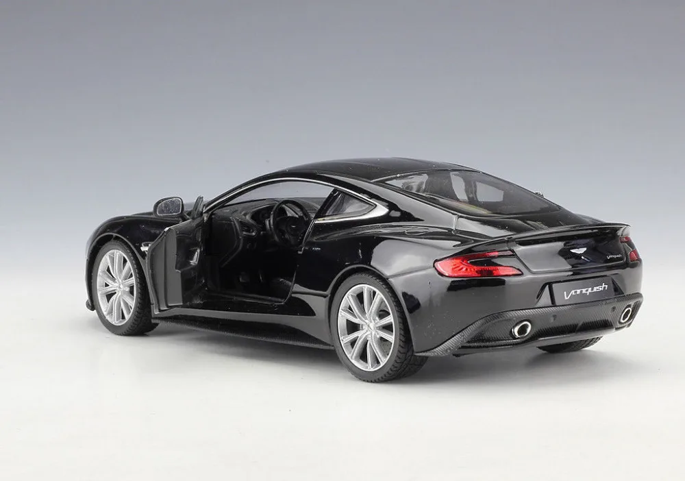 Welly 1:24 Aston Martin Vanquish черная литая модель спортивная гоночная машина игрушечная