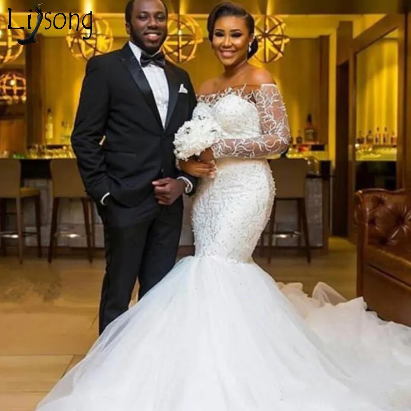 2018 New African Mermaid Wedding Dress Luxury Lace Off the Shoulder Beaded Tulle Sweep Train Wedding Gown Sexy Covered Button Bridal Dresses189