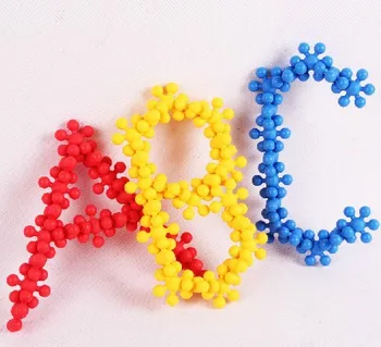 

Candice guo! New arrival hot sale colorful plastic toy blocks meihua shape quincunx DIY educational toy