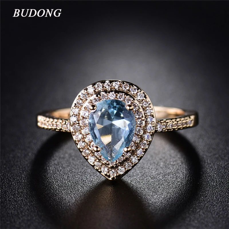 

BUDONG New arrival Finger Ring for Women Gold Color Light Blue Oval Crystal Zircon Elegant Occasional Wedding Jewelry XUR305