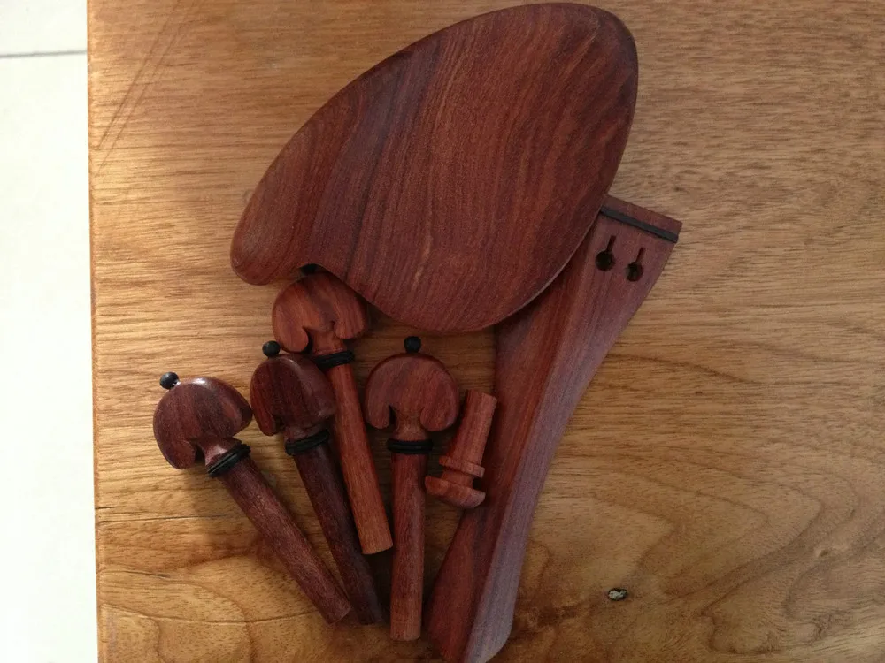 

2 sets of Nice violin fittings 4/4 red rosewood