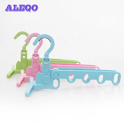 

Travel Portable Folding Hanger Multifunction Magic Stretch Clothes Plastic Hangers Cloth Hanger