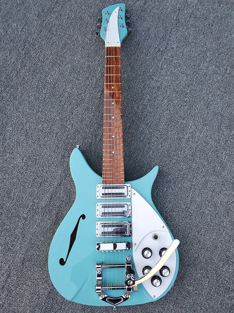 

Custom Shop R325 electric guitar,The fingerboard has varnish on it,half-hollow light blue body has a F hole in it.free shipping.