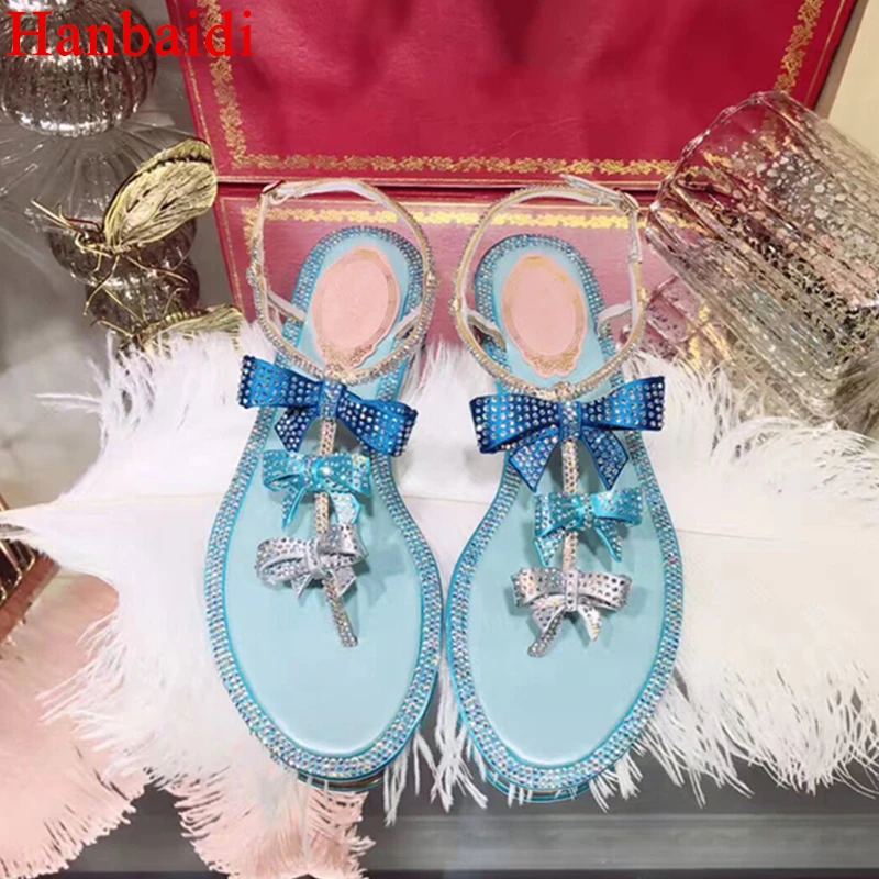 

Hanbaidi Pink Blue Women Summer Sandals Luxury Rhinestone Bowknot Peep Toe Buckle Strap Women Flats Runway Women Outdoor Shoes