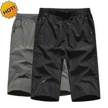 Хит летние тонкие длиной до колена свободные быстросохнущие одежда для мужчин среднего возраста Мужские Молодежные рабочие пляжные шорты, брюки размера плюс 5XL