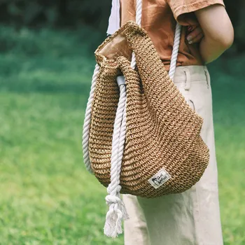 

LUCDO NEW Fashion Casual Drawstring Straw Beach Bags Women Shoulder Bags Handmade Straw Weaved Travel Backpack Mochila Feminina
