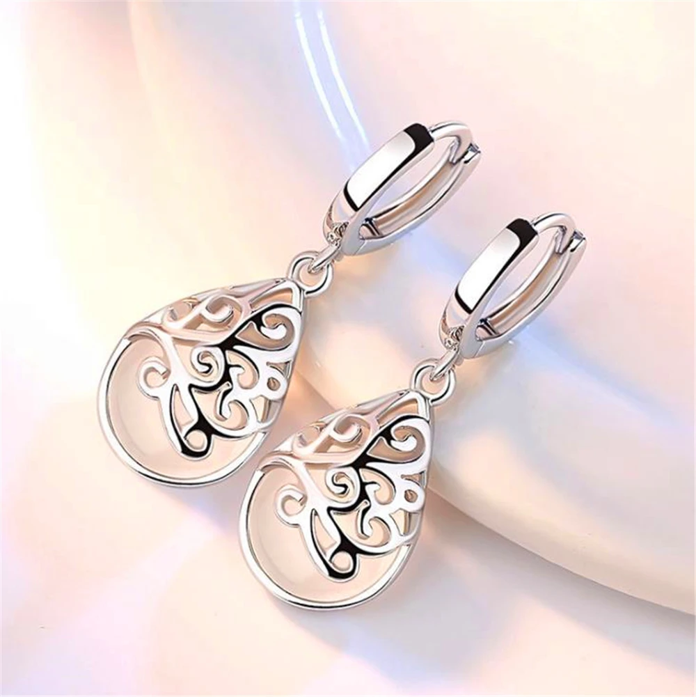 

Loredana lady fashion romantic OL temperament exquisite plating moonlight opal water drop totem pendant copper earrings gift