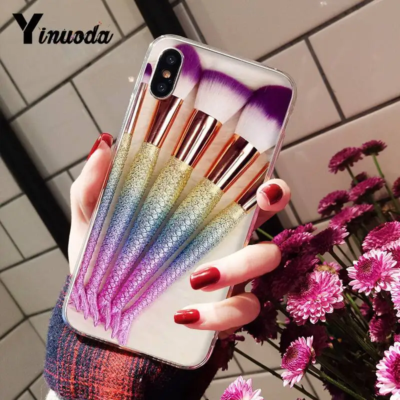 Beautiful girl's makeup brush painting