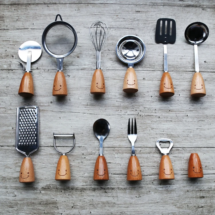 New Creative Cute 12Pcs Beech Wood Smiling Face Handle Stainless Steel Cooking Supplies Suits Kitchen Tools Set Cooking Utensil New Creative Cute 12Pcs Beech Wood Smiling Face Handle Stainless Steel Cooking Supplies Suits Kitchen Tools Set Cooking Utensil