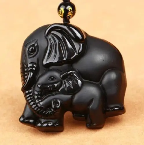 

Natural obsidian pendant good luck elephant like giant elephant mother and keep