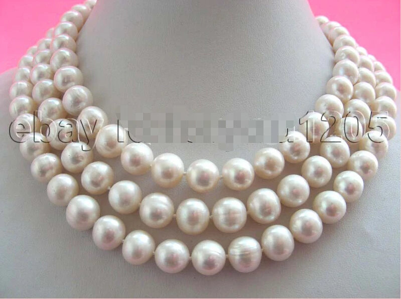 

A 50" Natural White 11mm Round Pearl Necklace14KGP!!
