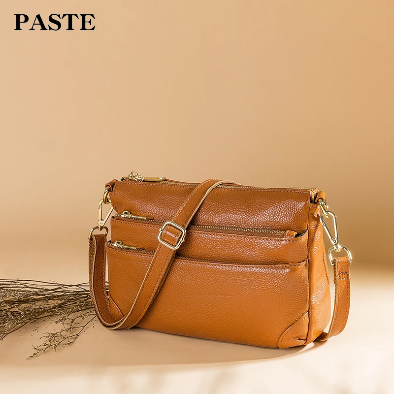 

2018 PASTE new leather handbags and more zipper compartment Shoulder Messenger bag first layer of leather handbag tide 8P2006
