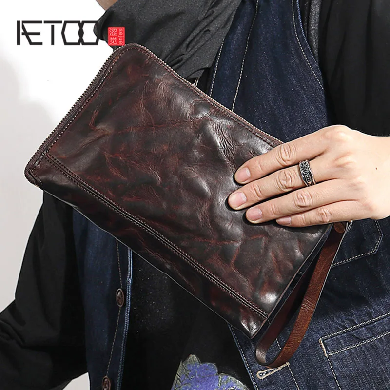 

Vintage handmade men's hand bag men's soft cowhide thin temperament envelope bag