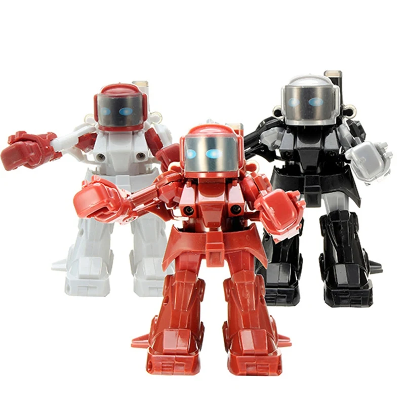 

Activity 1PCS 2.4G RC Remote Controller Robot Blue White Black Red Plastic Intellegent Boxing Battle Robot for Child