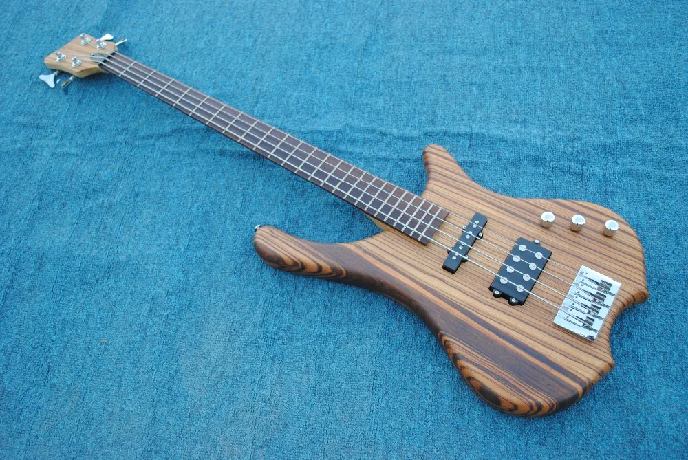 Good sound Starshine JAzz Bass electric guitar zebra wood body in