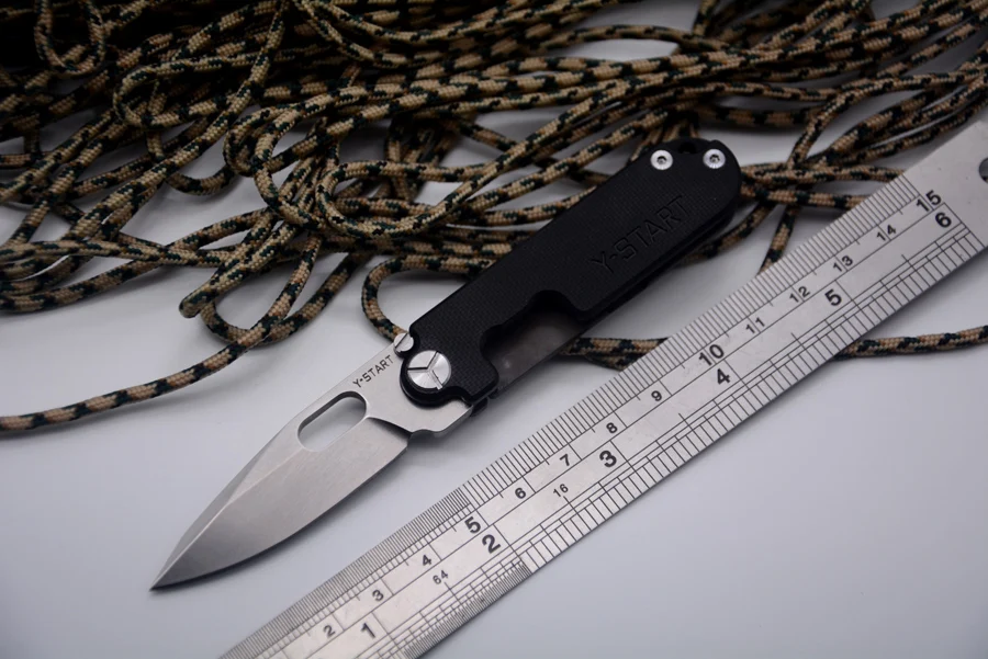 

YSTART Mini Pocket Knife G10 and Titanium Handle Fold Blade Flipper Open with Leather Case for Key Ring