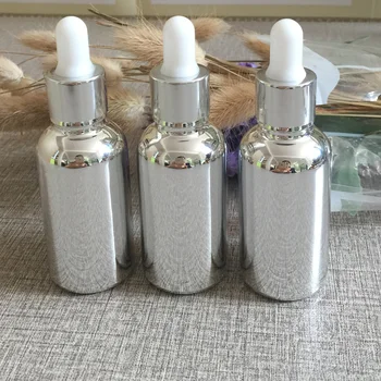 

110pcs/lot 30ml high temperature silver plated refillable empty dropper bottle,glass essential oil bottle,perfume subpackage jar