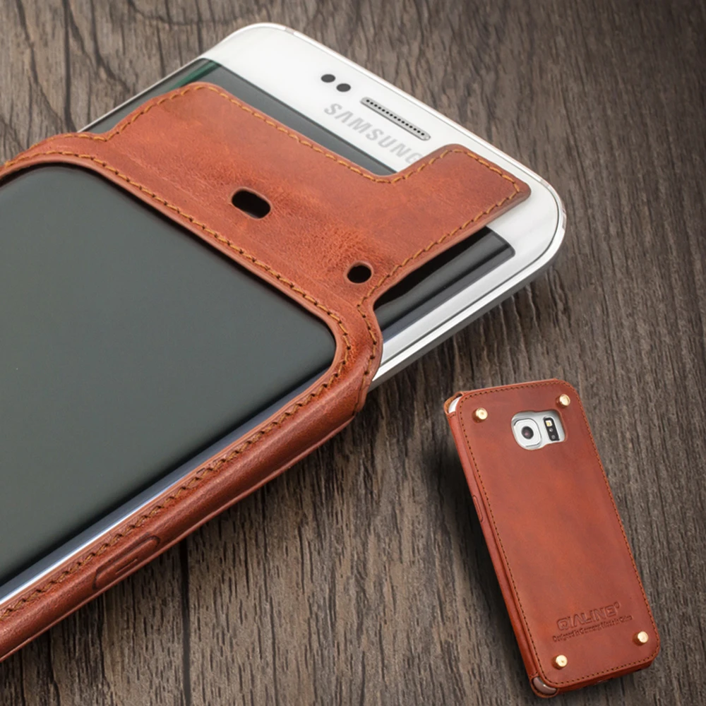 imágenes para 2015 Diseño Único QIALINO Genuino caja Del Teléfono de Cuero para Samsung Galaxy S6 edge Diseño de Remaches en Volver proteger el teléfono y cuero imágenes para 2015 Diseño Único QIALINO Genuino caja Del Teléfono de Cuero para Samsung Galaxy S6 edge Diseño de Remaches en Volver proteger el teléfono y cuero