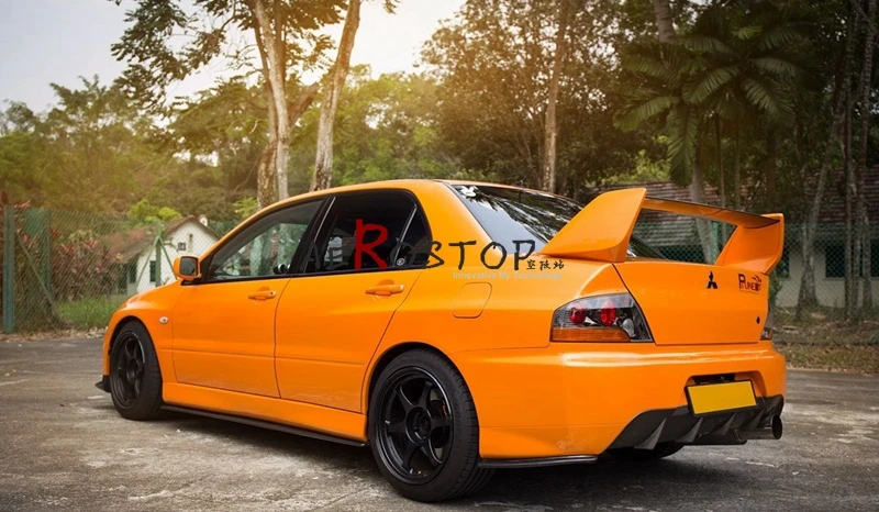 

EVO 9 DAMD STYLE REAR BUMPER EXTENSIONS FRP FIBER GLASS