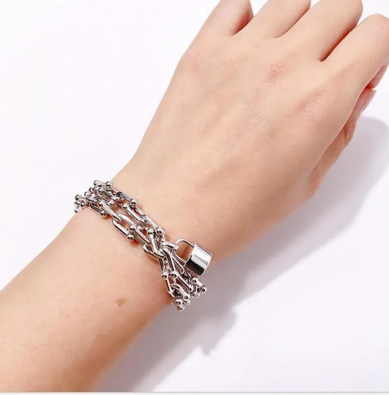 Armbanen voor vrouwen ювелирные изделия из титановой стали t образная u цепь замок мяч