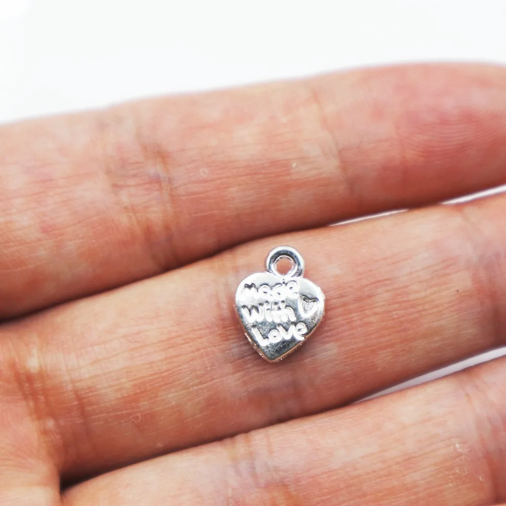 

Hot sell 40pcs metal bright silver Love Heart charms Pendant for Crafts Jewelry Making Accessories