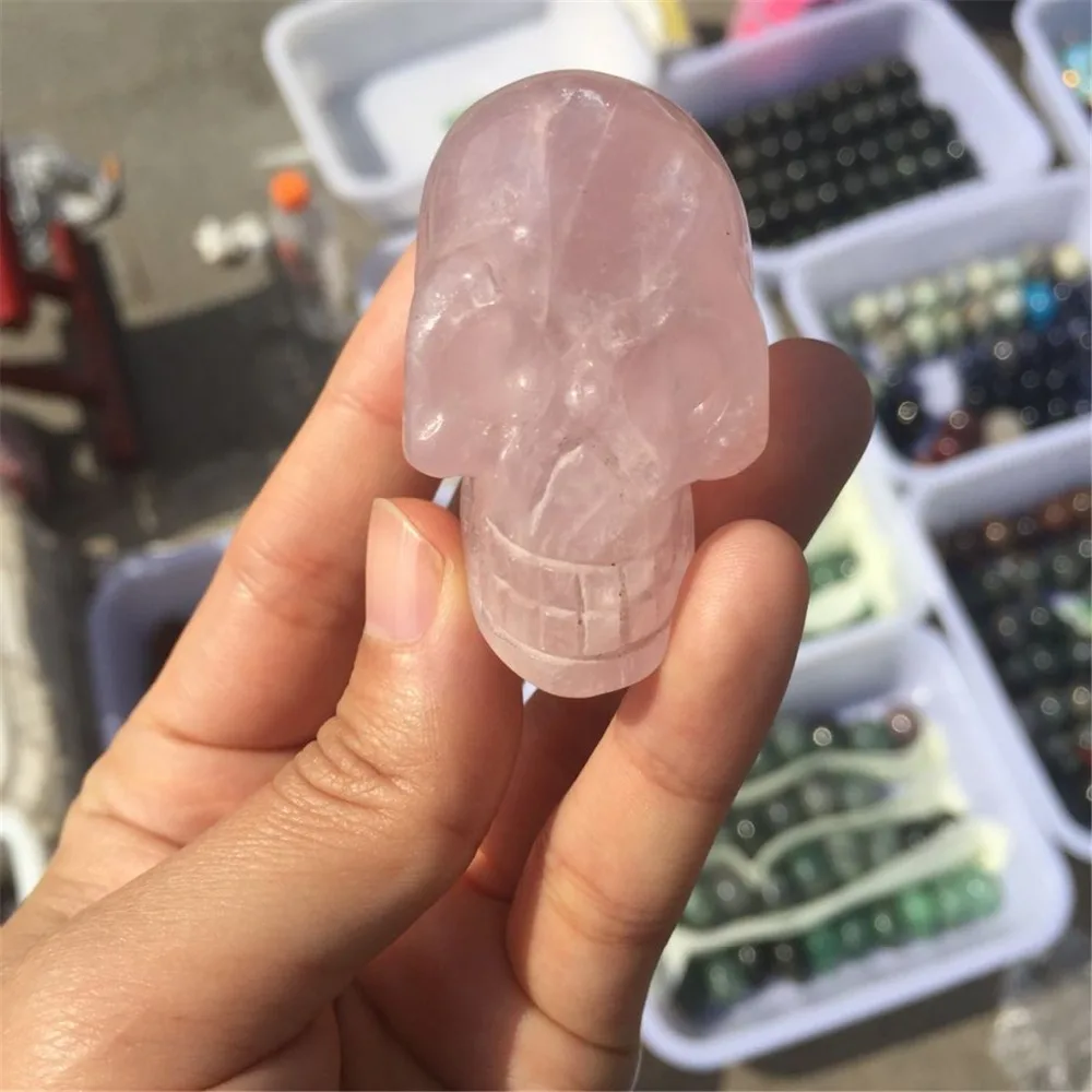 

1pcs free shipping beautiful natural rose quartz crystal skull reiki healing chakra hand carved figurine for treatment as gift