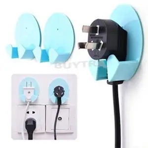 

New 1 Pcs Home Office Household Storage Holders Racks Wall Adhesive Plastic Power Plug Holder