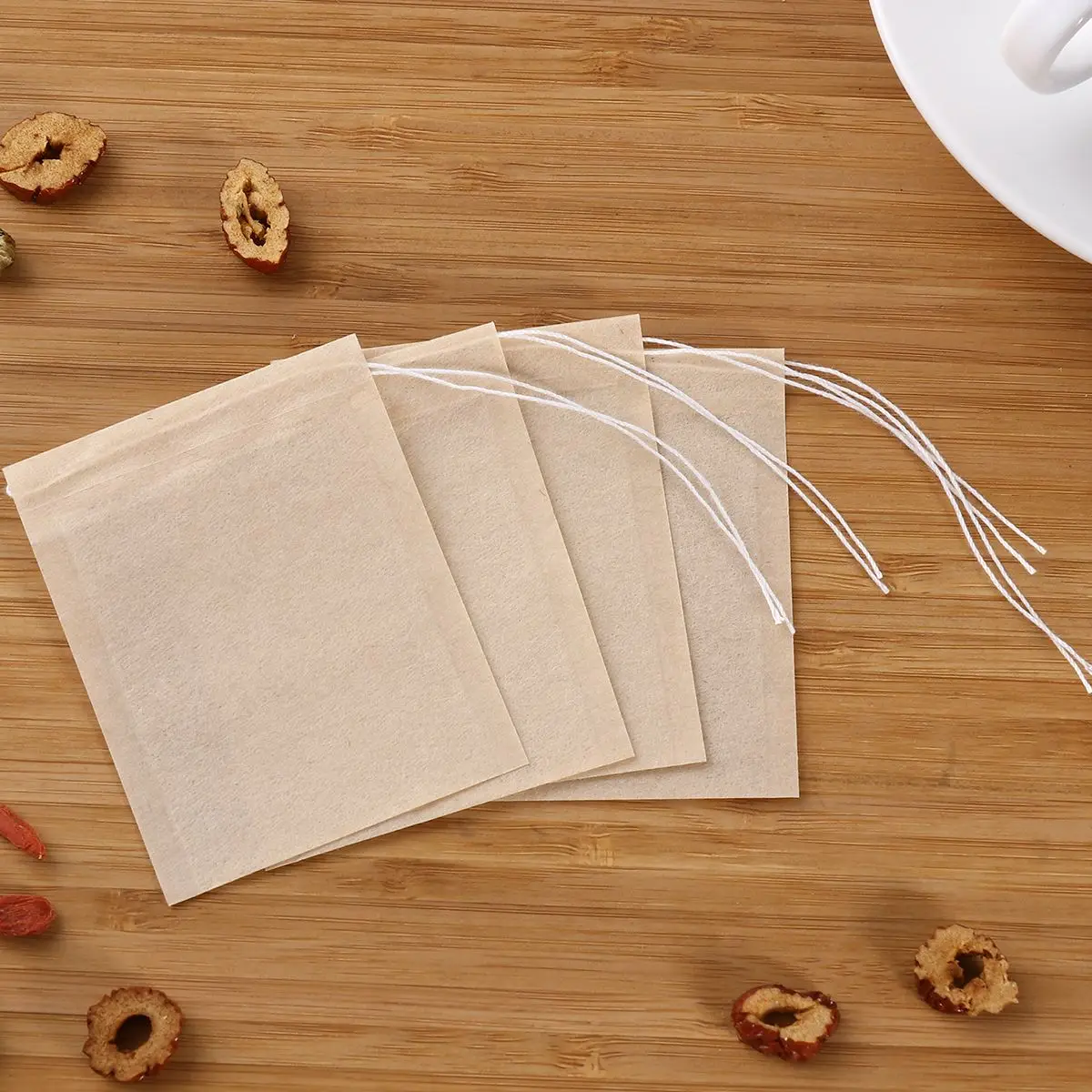 200pcs Non-Woven Fabrics Teabags Drawstring Tea Bag Filter Paper Empty Tea Pouch Bags for Loose Leaf Tea Powder Herbs Wholeasle