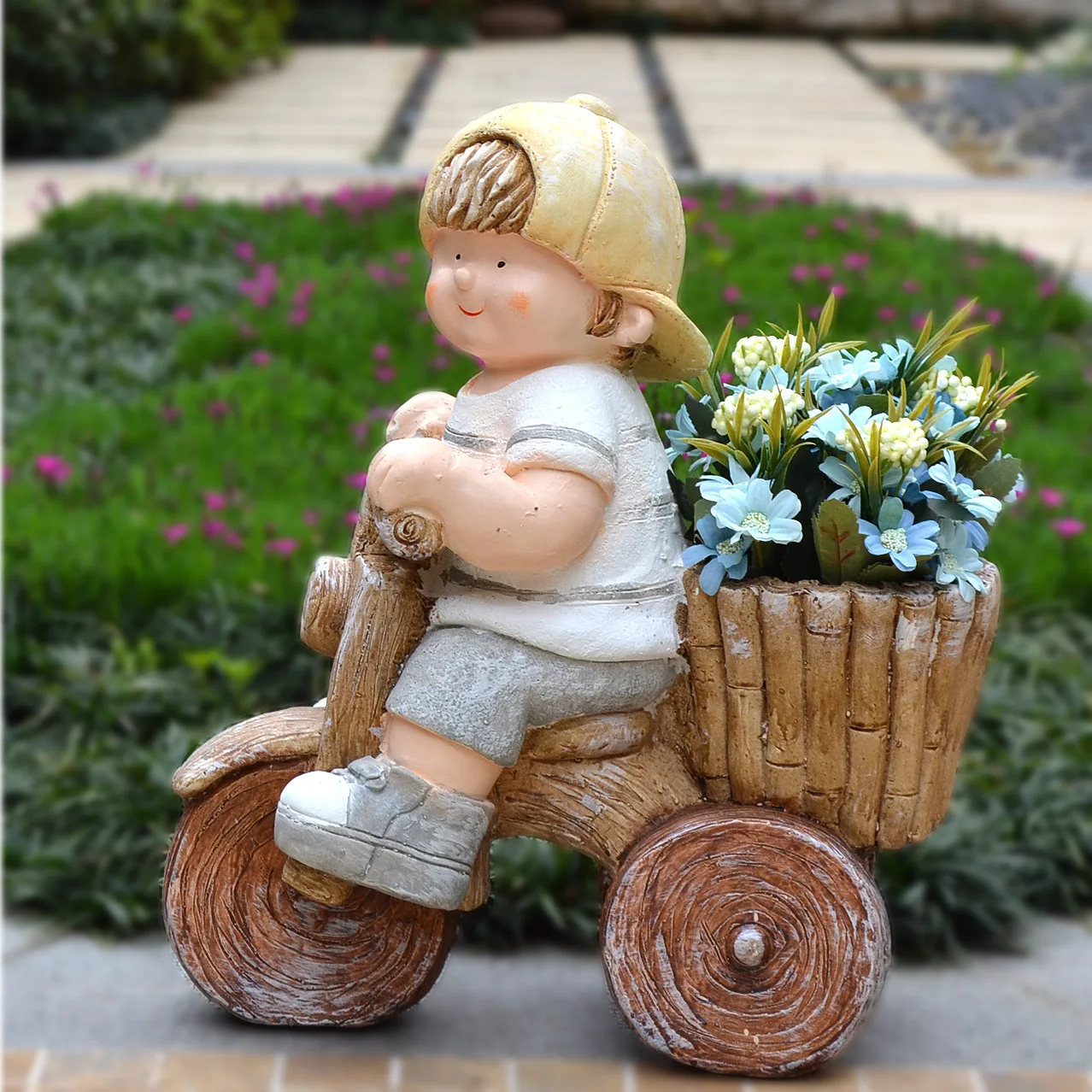 

Garden courtyard villa decoration cycling boy flower pot decoration crafts garden kindergarten decoration landscaping statue