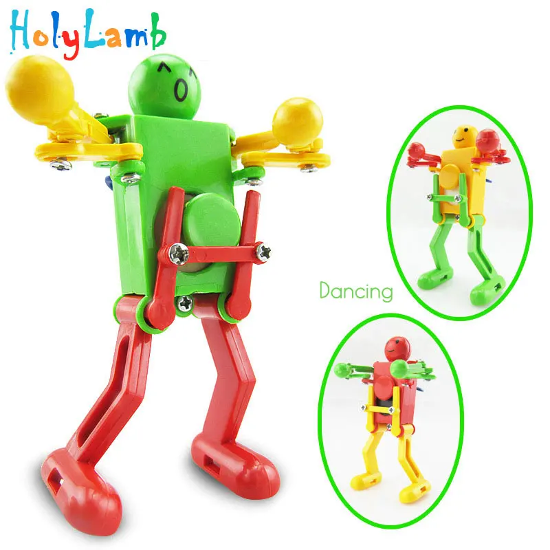 1Pcs Random Color Novelty Dancing Robot Gift Kids Children Baby Clockwork Classic Educational Toys Develop Intelligence Gift 1Pcs Random Color Novelty Dancing Robot Gift Kids Children Baby Clockwork Classic Educational Toys Develop Intelligence Gift
