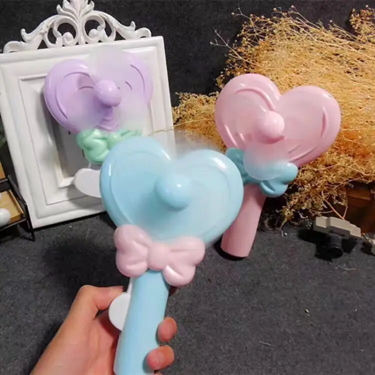 

Candy color mini carton heart hand presser fan.children lovely safty enviromental fan