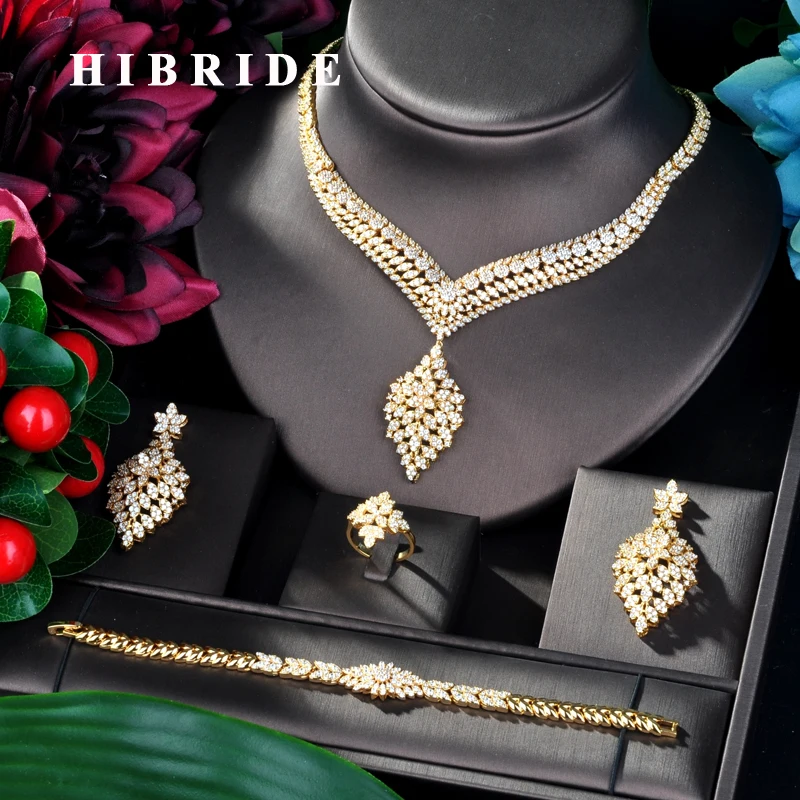 Hibride роскошь дизайнерские шлепанцы; цвет золотой, Цвет Свадебные циркониевое ожерелье кубической формы Дубай 4 шт. платье комплект ювелирны... Hibride роскошь дизайнерские шлепанцы; цвет золотой, Цвет Свадебные циркониевое ожерелье кубической формы Дубай 4 шт. платье комплект ювелирны...