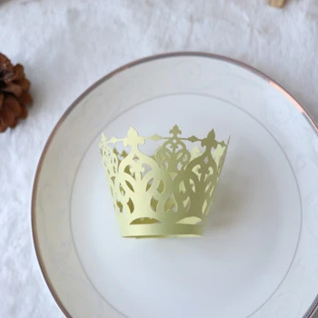 

Free Shipping New 50Pcs 21 Colors Crown /Witch/Castle Laser Cut Cupcake Wrappers Liners Party Decorations New Year Wedding Decor