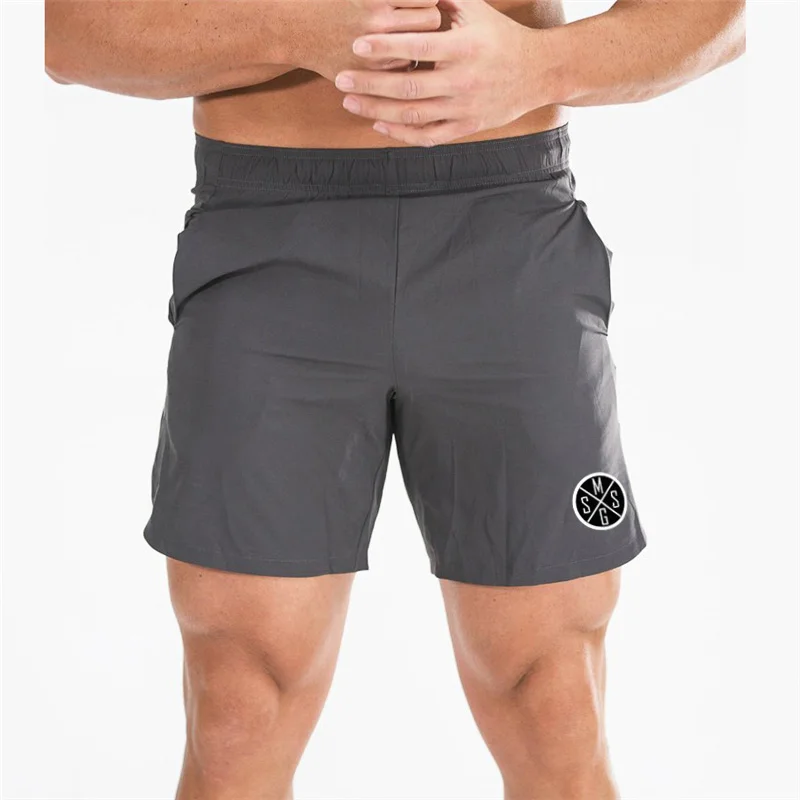 Muscleguys мужские облегающие короткие брюки фитнес спортивные штаны мужские шорты треники фитнес тренировки сухие мотоциклетные штаны