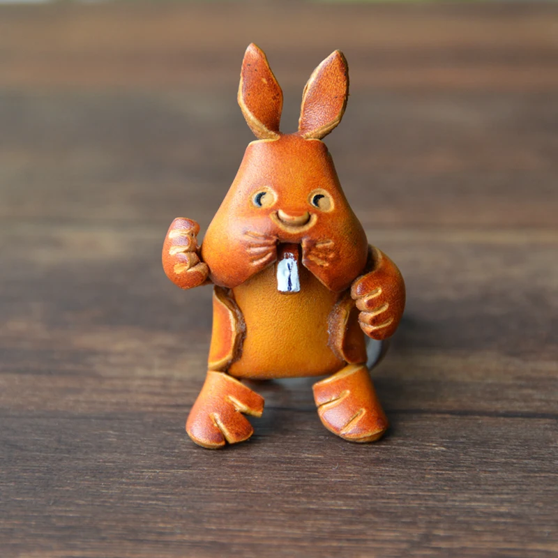 

Keychain handmade cute bunny leather car key ring hanger. Creative handmade cartoon animal key pendant gift