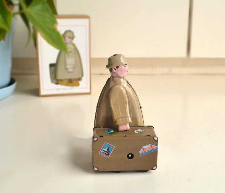 

Retro clockwork tin toys Classic clockwork tin businessman Tizhexingli businessman Collection