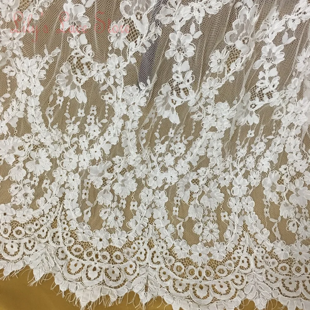 

Beautiful long wedding dresses lace fabric material in Light ivory/off white color Cheap factory price corded eyelash chantilly!