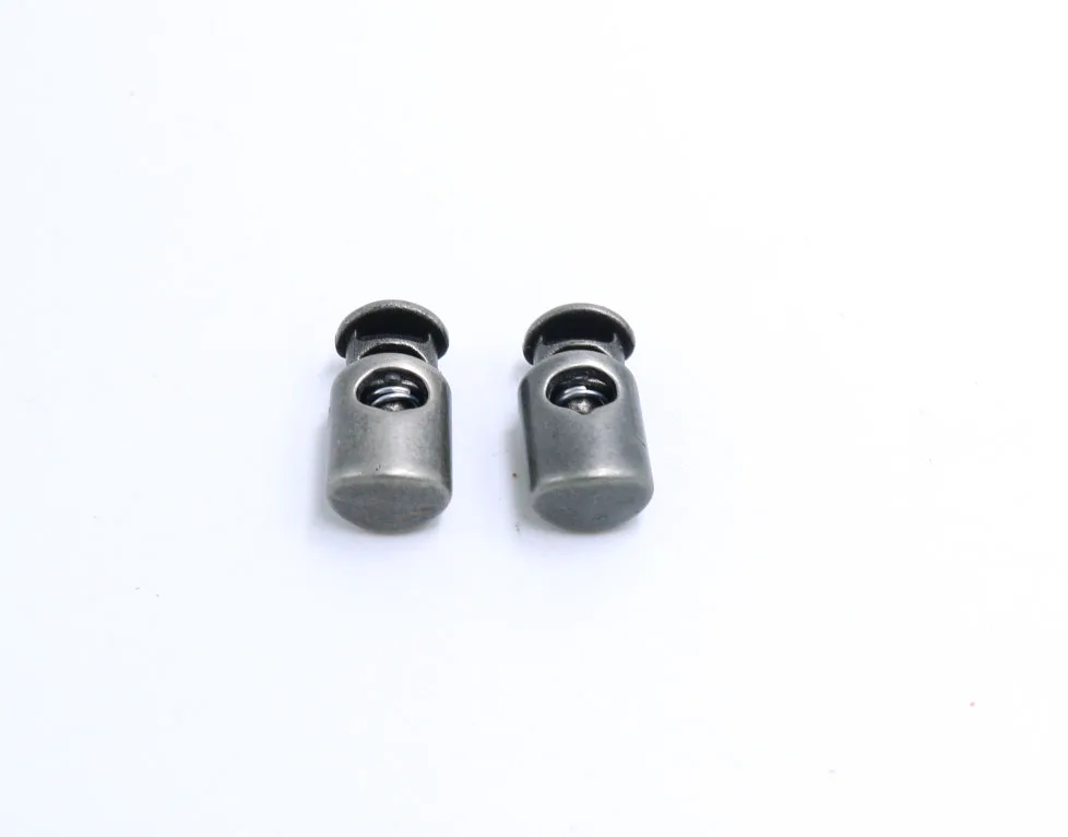 

100 Pcs Plastic Spring Stop Toggle Cord Locks End matt gun black 21*10mm