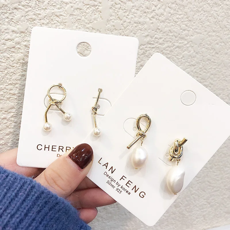

New cool wind asymmetric metal knotted pearl earrings female temperament simple wild earrings hot sale
