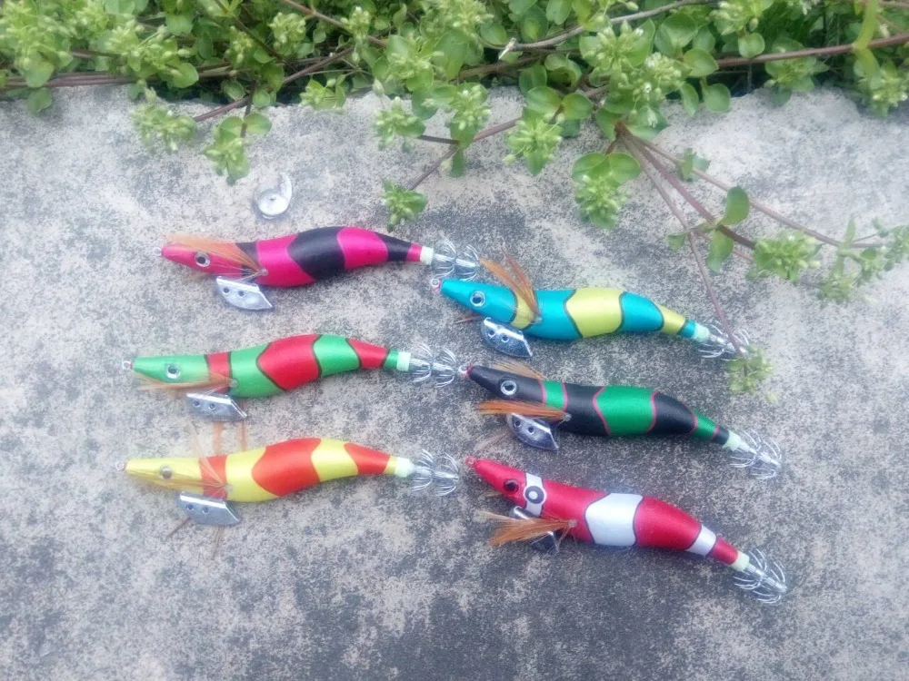 

MR OCTOPUS 12pcs 3.5# squid jigs,squid hook,. fishing lure . random colour mixed .13.5cm ,20g.glow in dark .