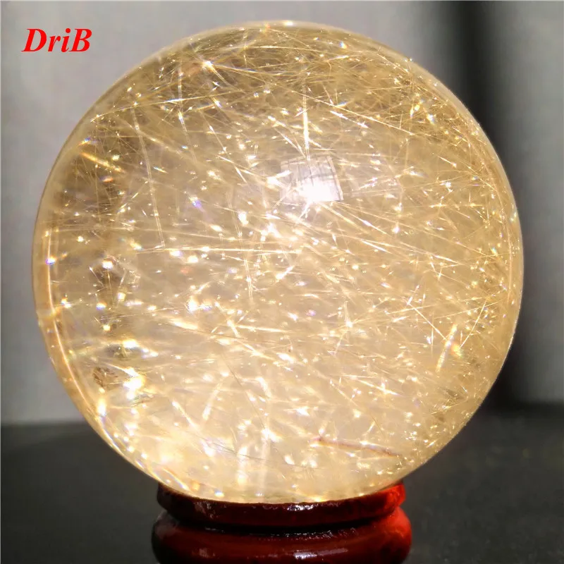 

Natural rutilated quartz crystal ball