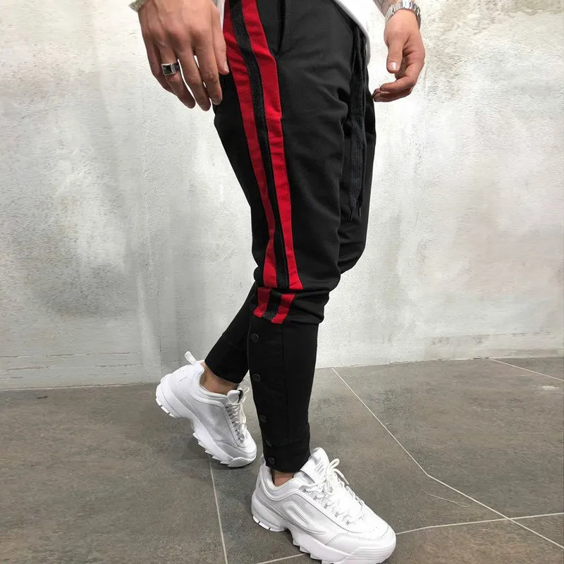 الهيب هوب الرجال الجانب مخطط Sweatpants 2019 جديد اللياقة البدنية الشارع الشهير الرباط السراويل الترنك مع زر عارضة صالح سليم الكاحل السراويل